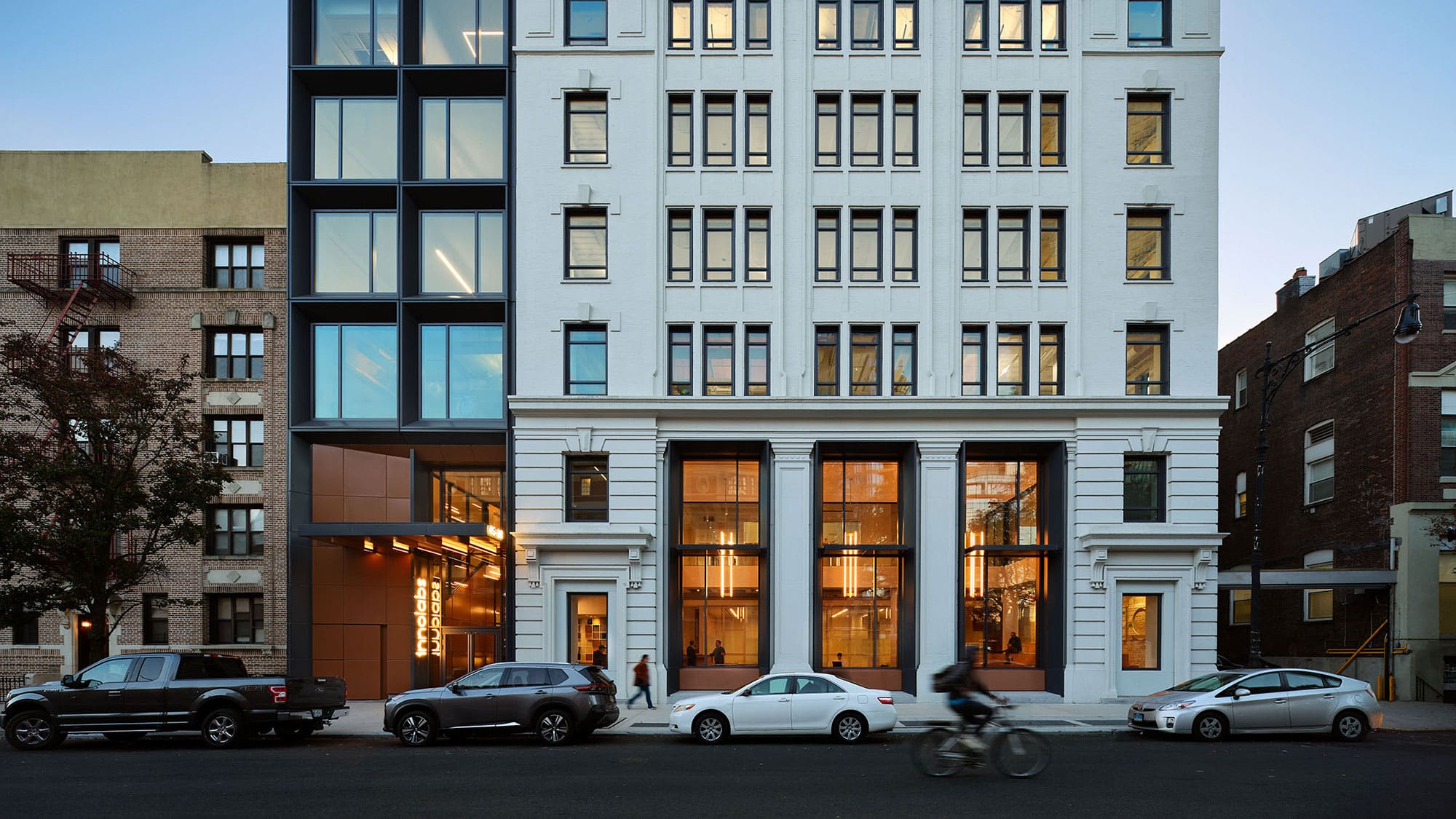 Sidewalk view of a architecturally-detailed office building face