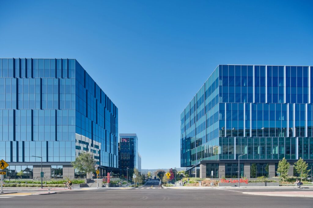 exterior of glass walled research and development buildings on the Landing campus