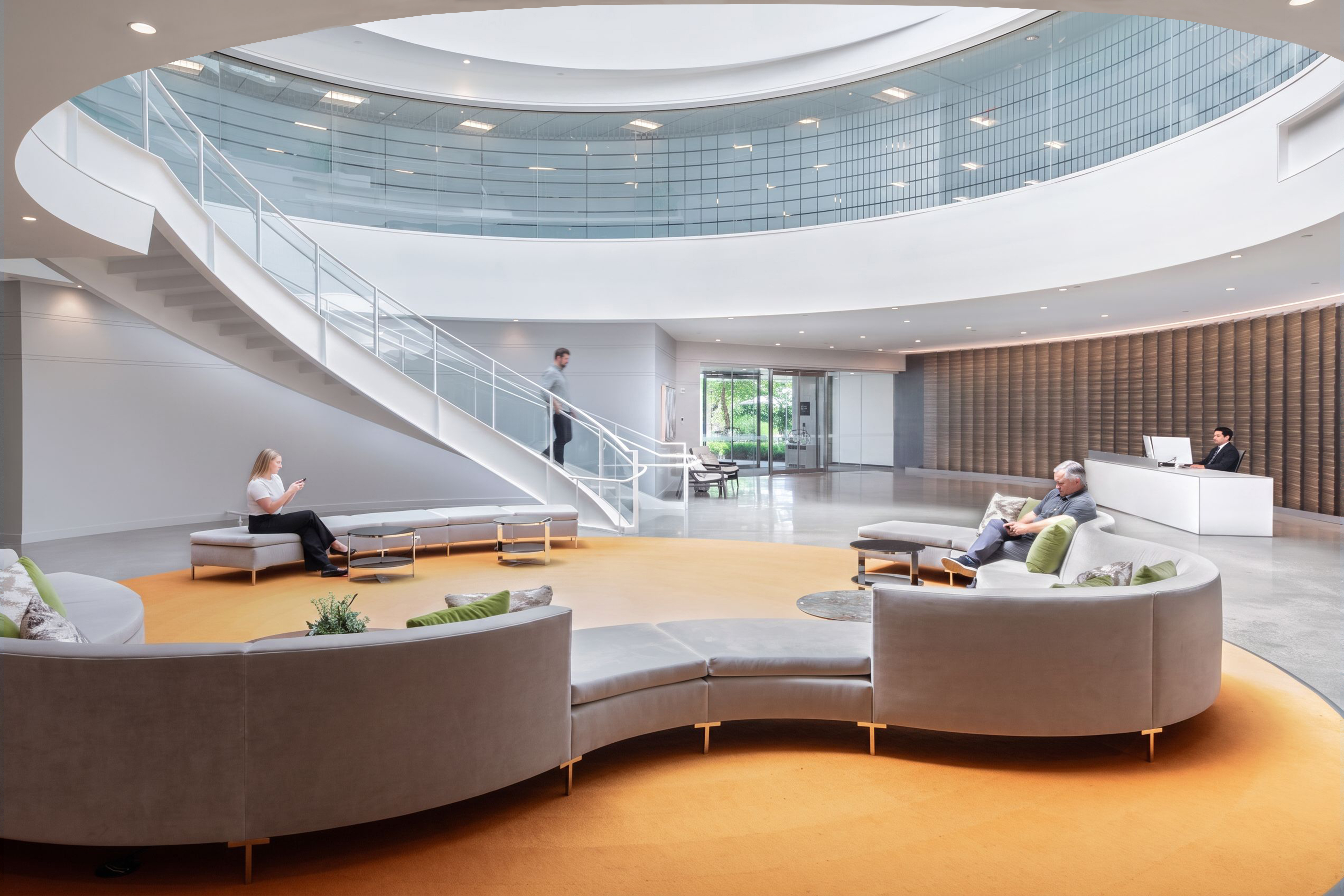 Lobby with seating and open staircase
