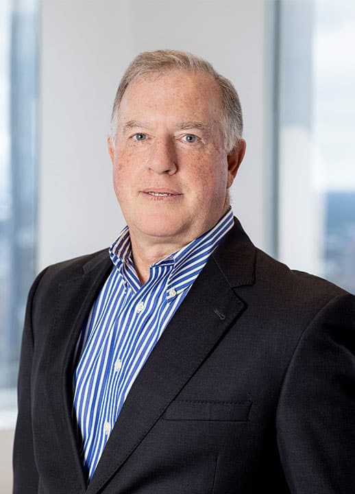 Corporate headshot of Senior Managing Director Andrew Moore