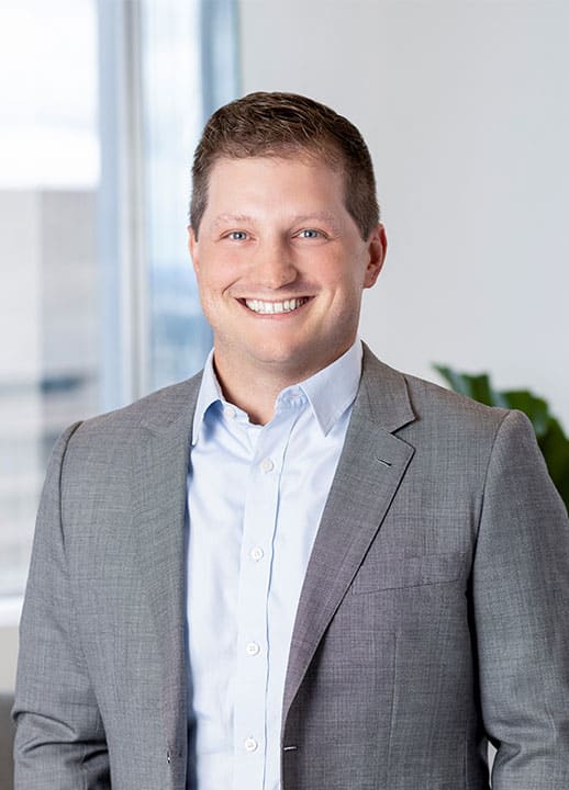 Corporate headshot of Senior Director Brian Grisaru