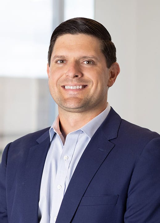 Corporate headshot of Managing Director Chris Rouches