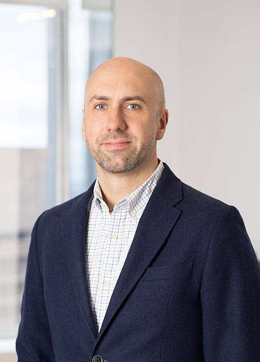 Corporate headshot of Senior Director Ed Jaram