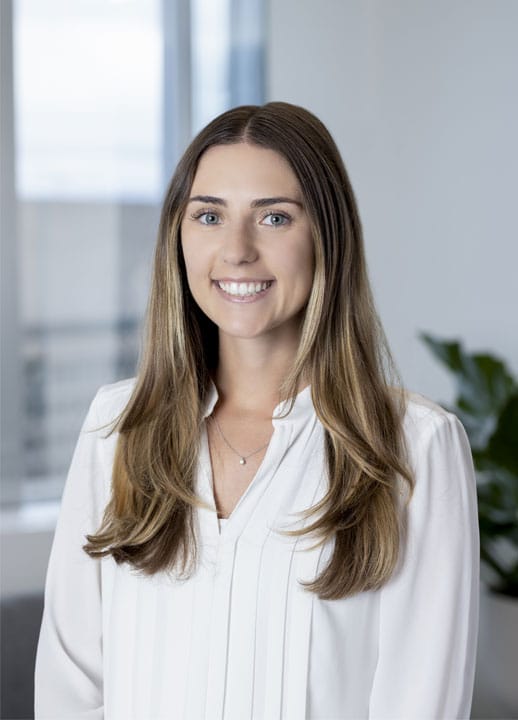 Corporate headshot of Analyst Gaby Dabek