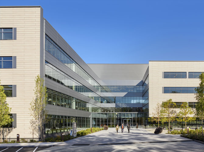 A crisp morning outside a premium life science campus entrance