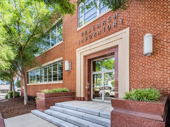 A prestigious brick and stone entrance to a research laboratory