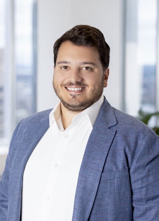 Corporate headshot of Senior Associate Tom G. Ragno